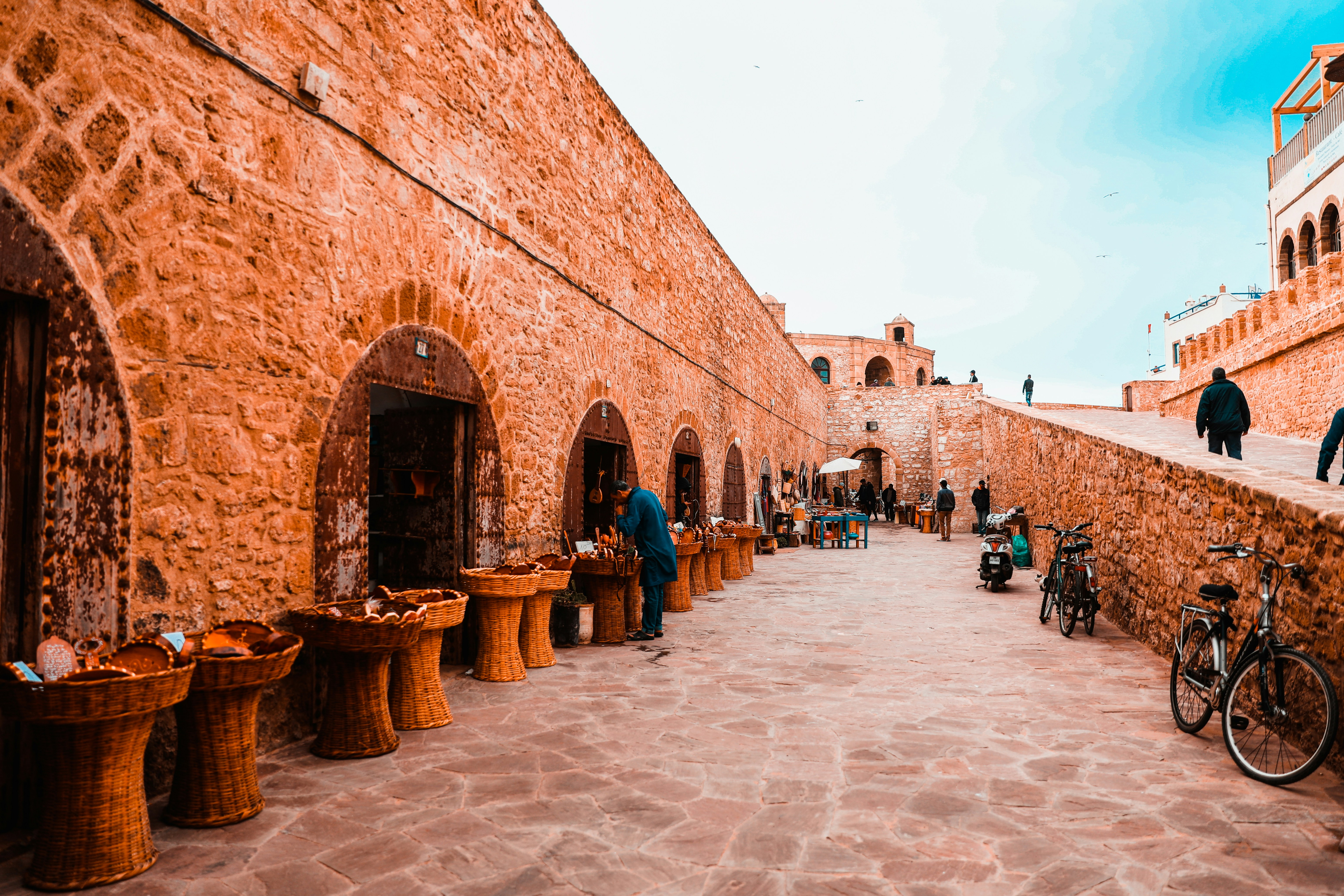 Warm stone walls and artisan stalls in Essaouira